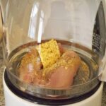 Chicken breasts in a coffee maker.