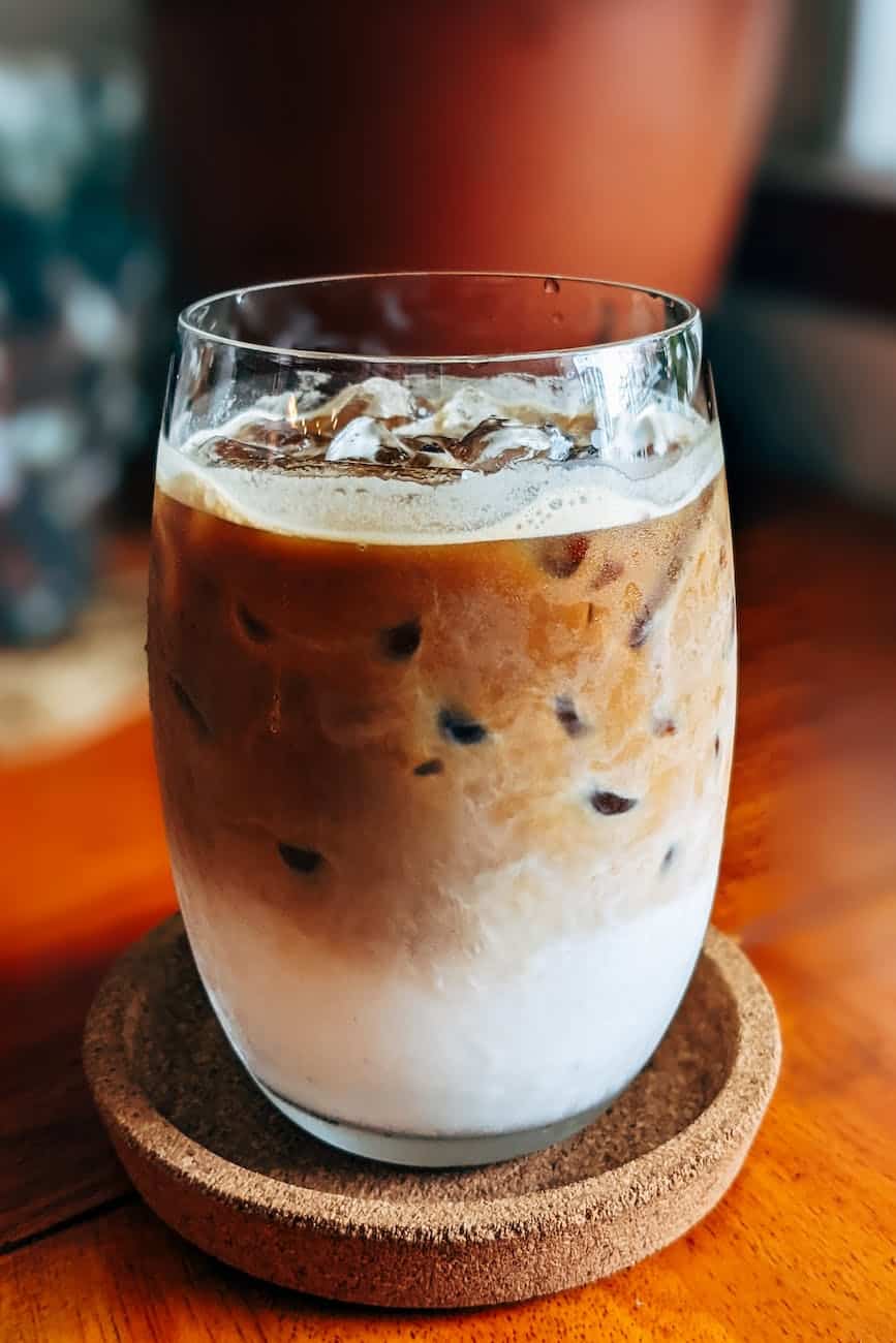 iced coffee on clear drinking glass