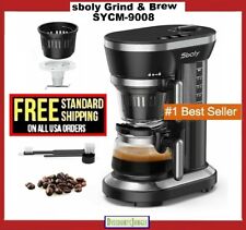 A coffee maker with the words shoy grind and brew.