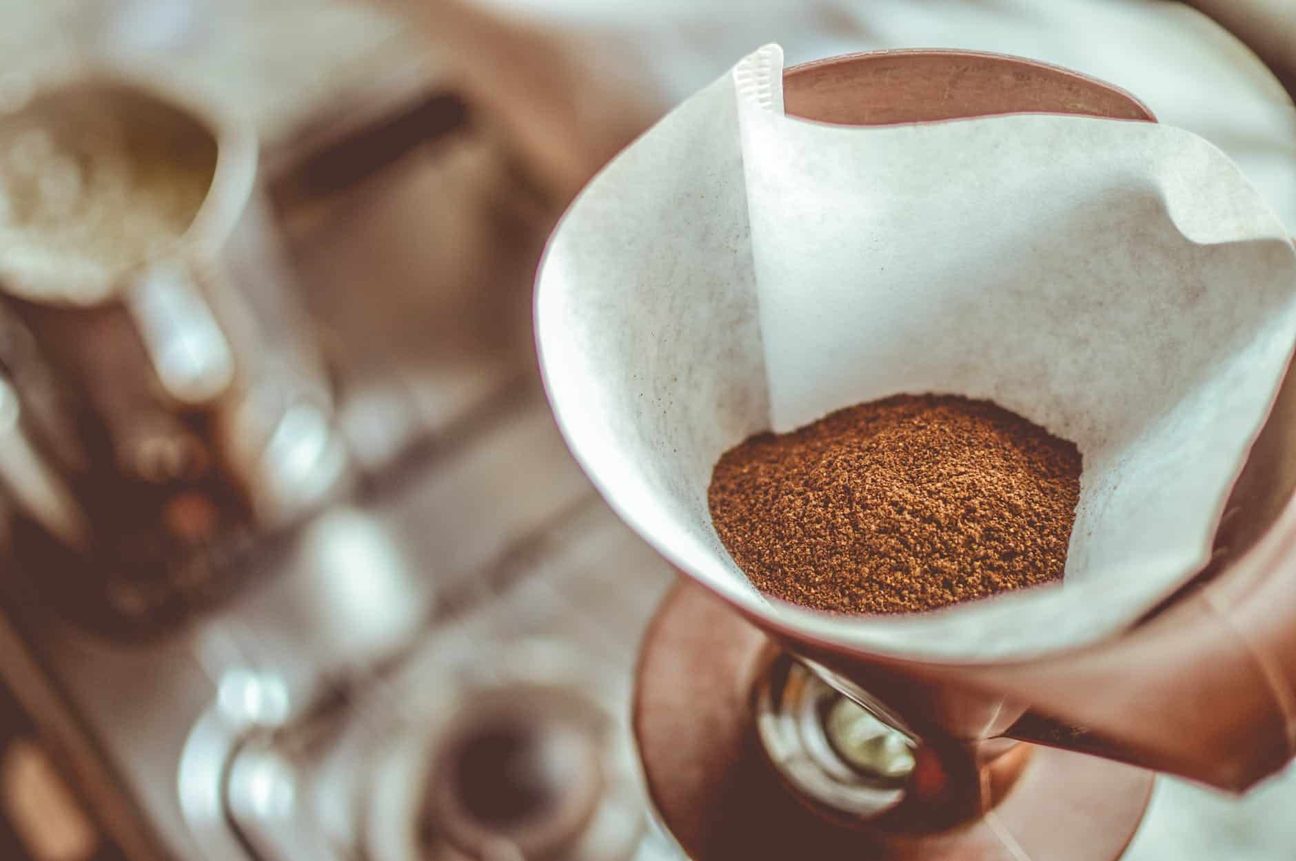 brown coffee on white strainer