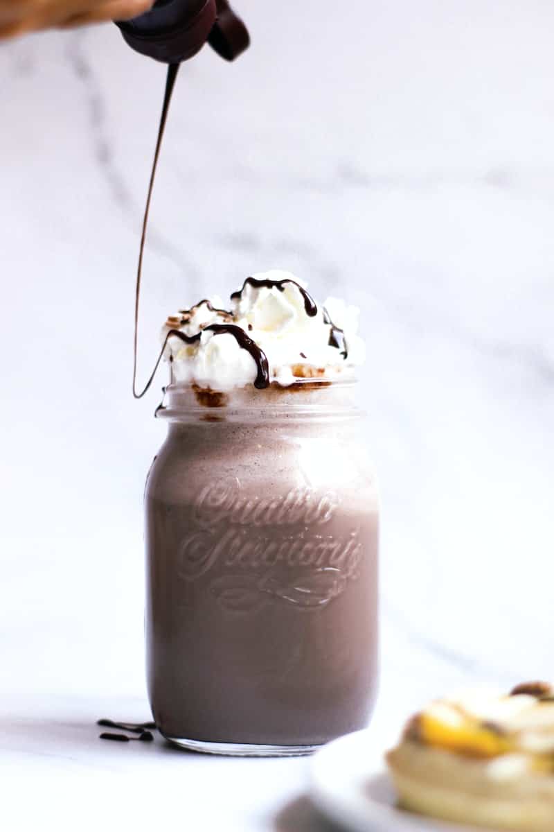 A Chocolate Frappuccino Drink in a Glass Jar
