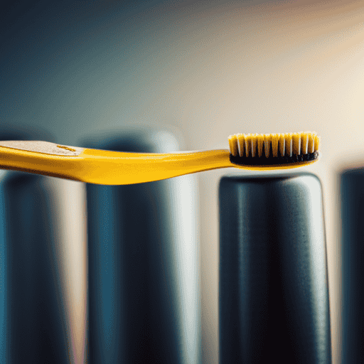 An image showcasing a close-up of a toothbrush coated with a vibrant yellow turmeric paste, gently brushing a set of stained teeth, capturing the transformative process of turmeric's teeth-whitening properties