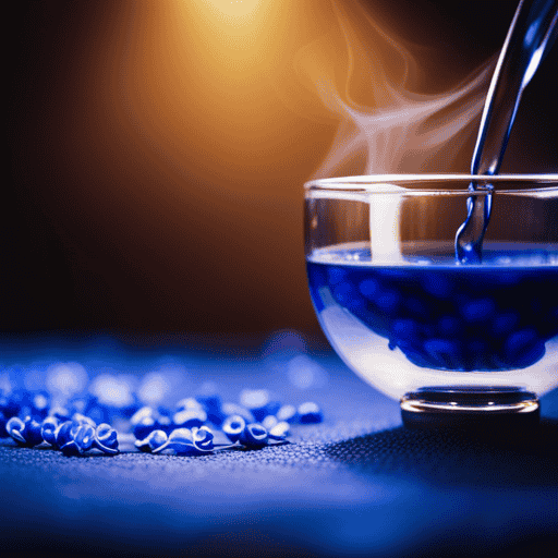 An image that showcases the mesmerizing process of brewing Blue Pea Flower Tea, capturing the intricate dance of vibrant blue petals steeping in hot water, releasing their enchanting color and delicate aroma