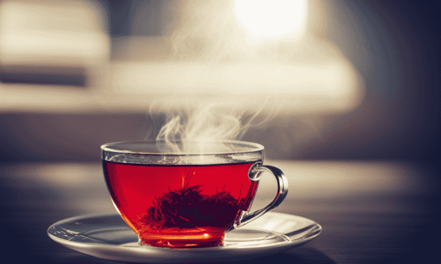 An image of a vibrant red teacup filled with steaming rooibos tea, surrounded by delicate rooibos tea leaves