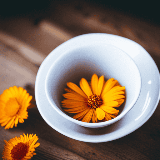 An image of a serene scene: a delicate white porcelain teacup filled with vibrant golden calendula loose flower tea, steam gently rising, surrounded by scattered calendula petals on a rustic wooden table