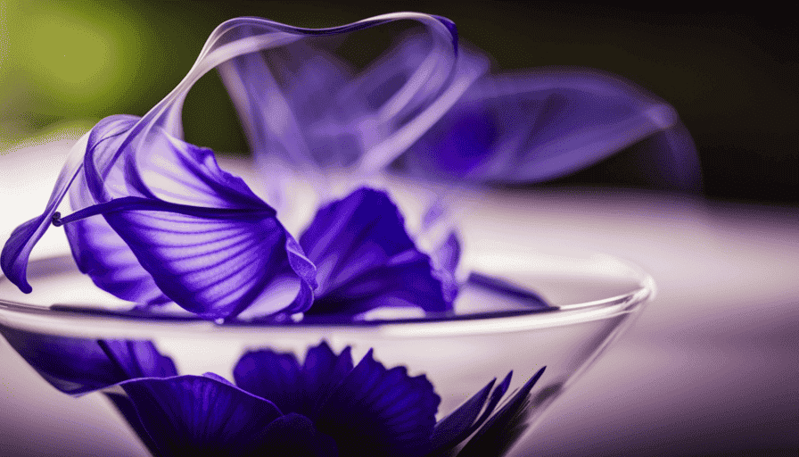 An image showcasing a vibrant blue butterfly pea flower tea in a clear glass teapot, with delicate petals and swirling tendrils gracefully unfurling in the hot water, emanating a soothing aroma