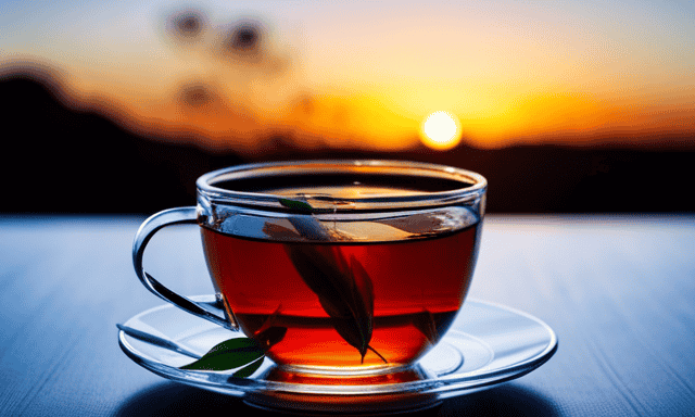 An image showcasing the vibrant red hue of a freshly brewed cup of Rooibos tea, set against a backdrop of a serene African sunset
