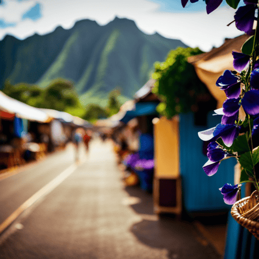 An image showcasing a vibrant Hawaiian landscape with a bustling local market, adorned with stalls overflowing with baskets of fresh Butterfly Pea Flower tea leaves, their stunning indigo hues captivating passersby