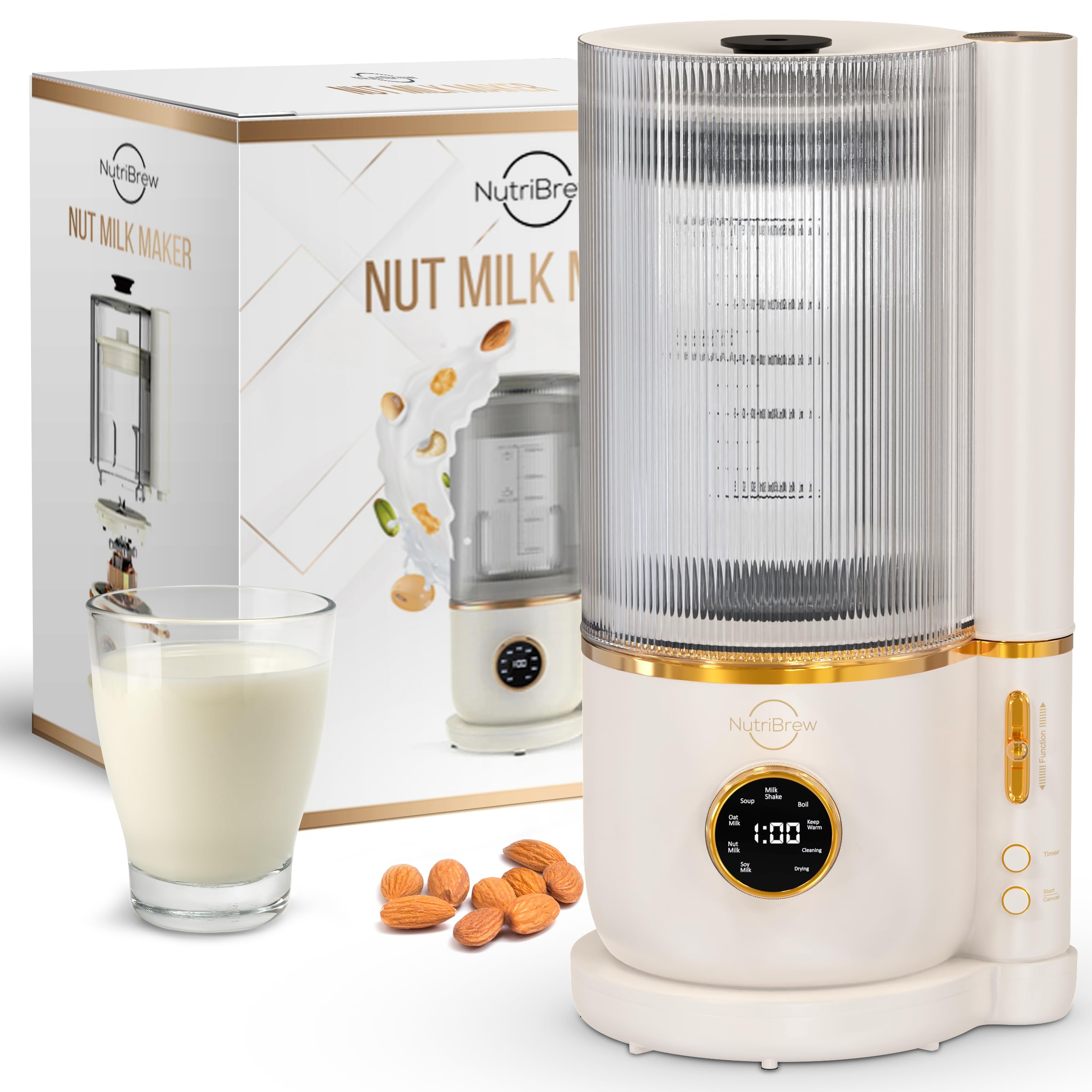 A nut milk maker with a glass of milk next to it.