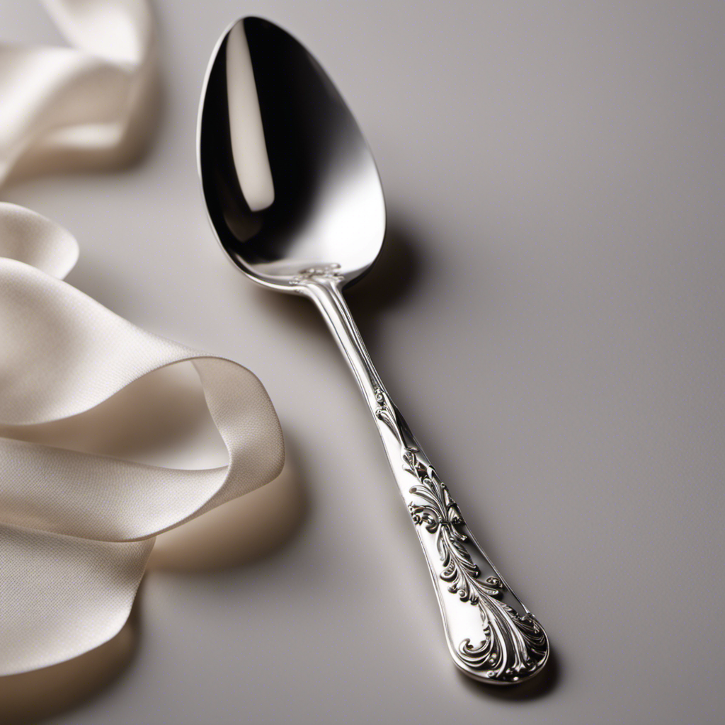 An image showcasing a delicate silver teaspoon gently holding precisely 1 1/2 grams of a fine powder, with a background featuring a soft, neutral-toned kitchen setting, evoking curiosity about the conversion