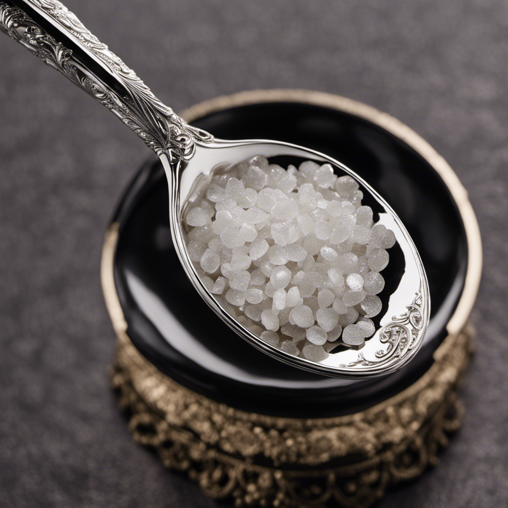 An image showcasing a delicate, miniature silver teaspoon gently holding a precisely measured, shimmering mound of sugar
