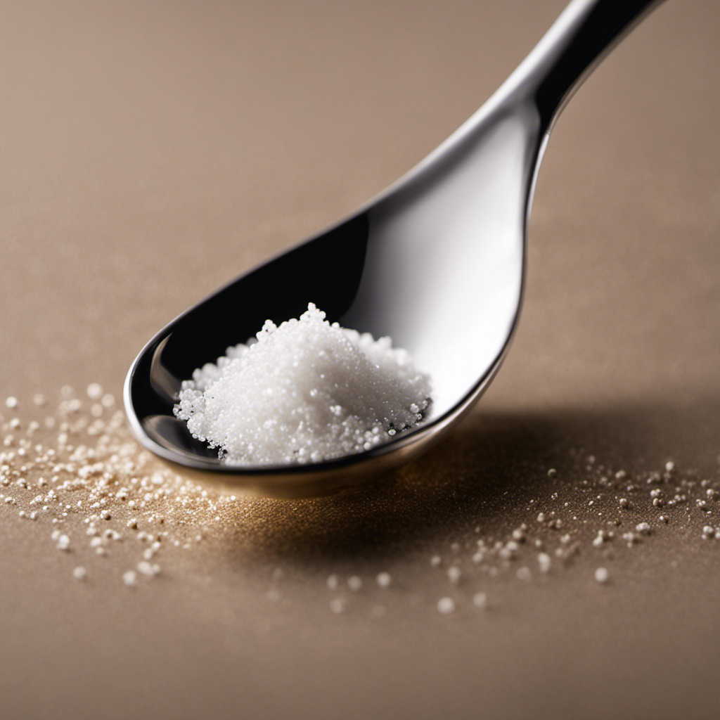 An image that showcases a precise measurement of 1 gram of salt, elegantly displayed in a pristine teaspoon, with fine granules pouring gently into the teaspoon, capturing the essence of accurate measurements