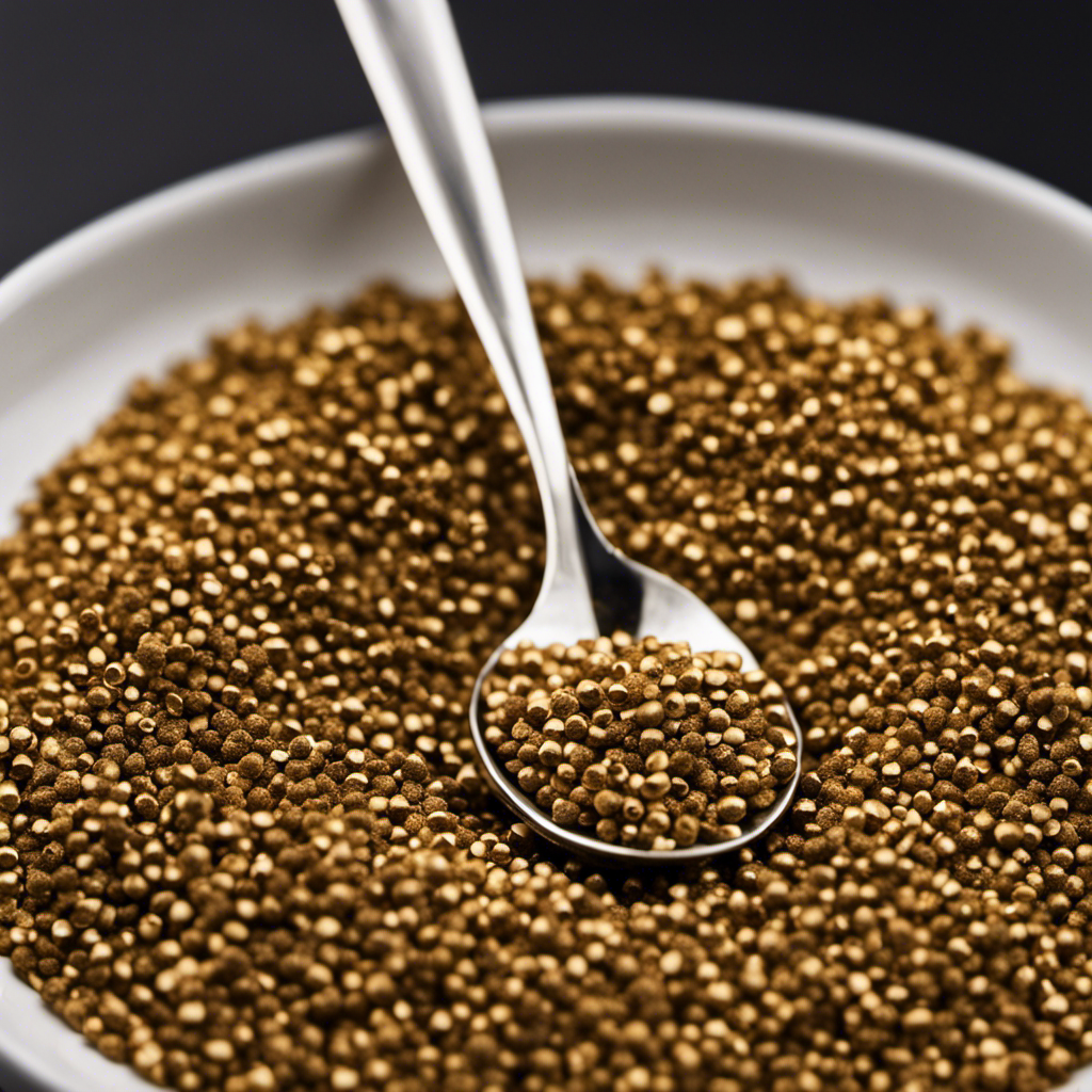 An image showing a teaspoon filled with tiny granules to depict 100 mg