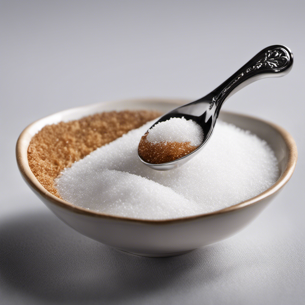 An image of a small, delicate teaspoon filled halfway with granulated sugar, perfectly leveled