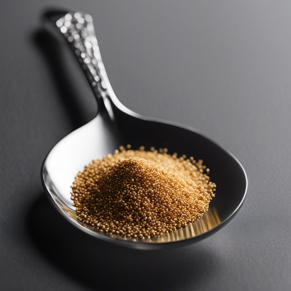 An image depicting a clear, labeled teaspoon filled with fine granules weighing precisely 15 milligrams