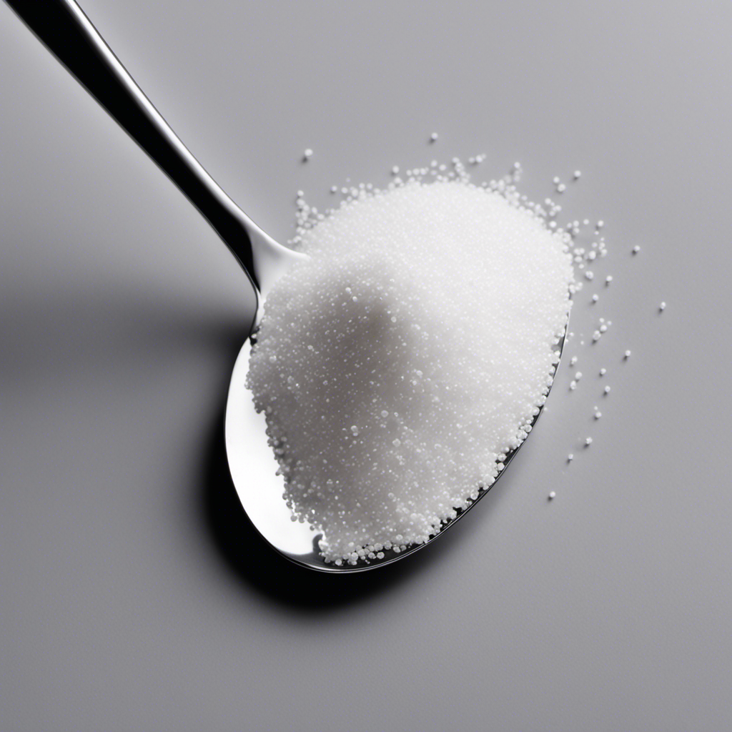 An image showcasing a sleek silver teaspoon overflowing with precisely measured white sugar, representing 3 grams