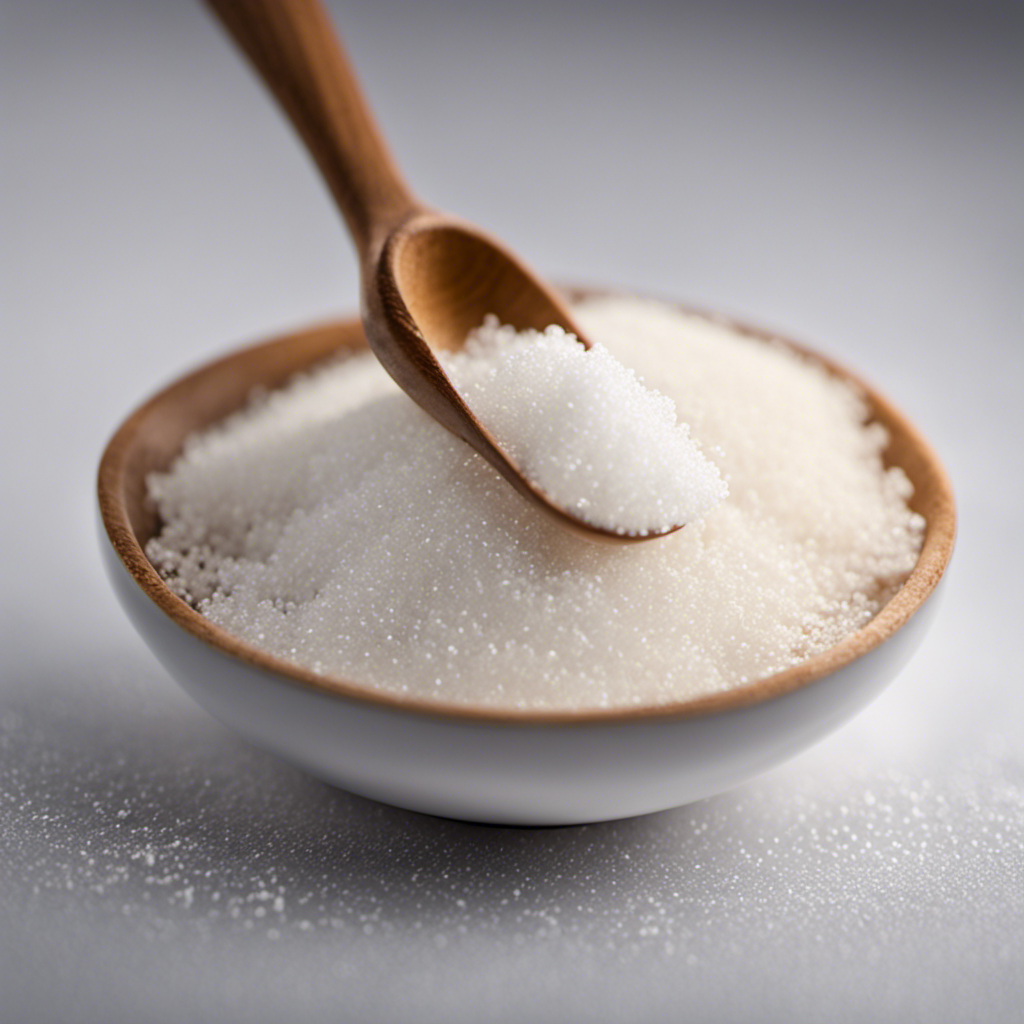 An image showing a small heap of white granulated sugar, equivalent to 3 grams, carefully measured and poured into a teaspoon