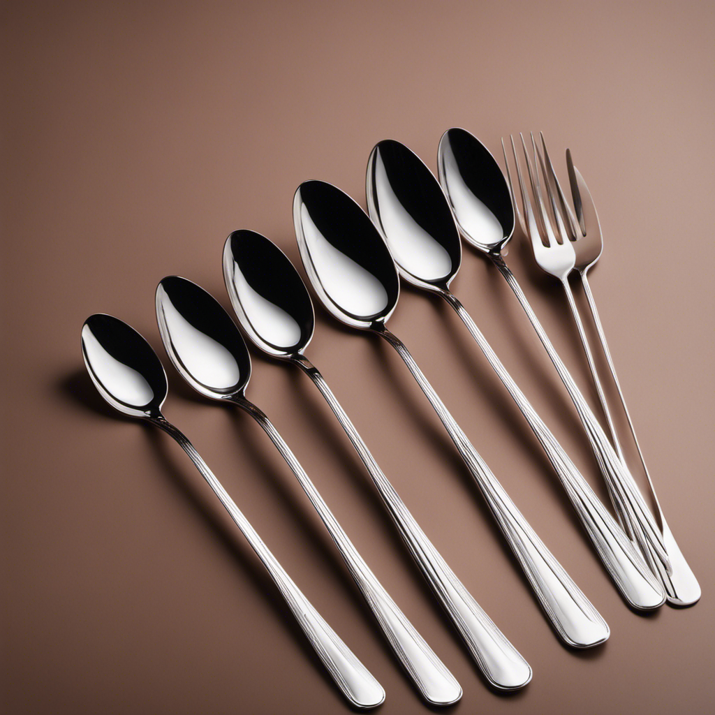An image showcasing five shiny silver teaspoons, neatly arranged in a row beside a delicate porcelain cup