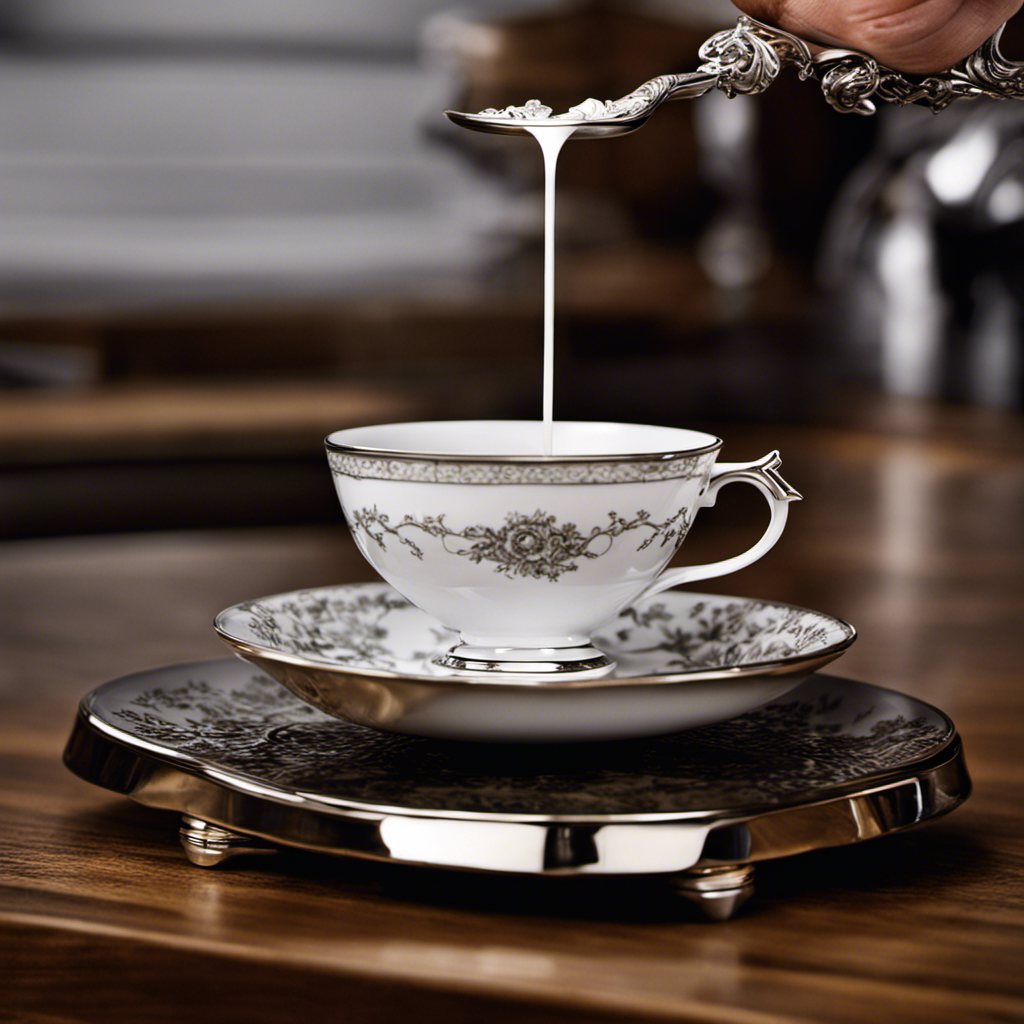 An image of a delicate porcelain teacup balanced on a kitchen scale, with precisely three tiny silver teaspoons nestled inside