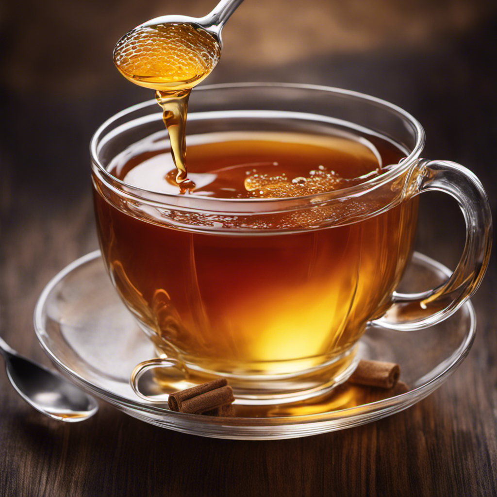 An image showcasing a glass teacup filled with freshly brewed kombucha, highlighting the meticulous pouring of 1 cup of tea