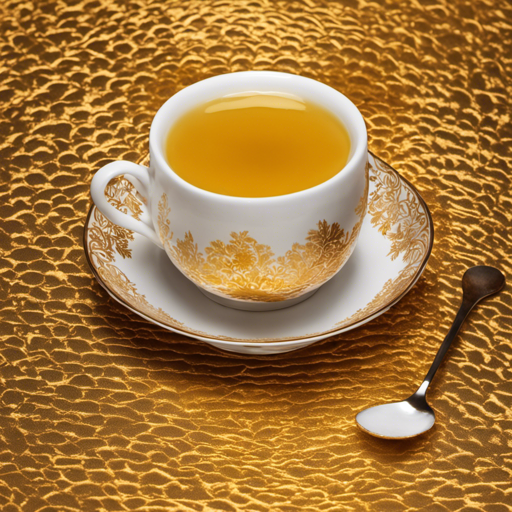An image capturing the warm hues of turmeric ginger tea being poured into a delicate porcelain cup